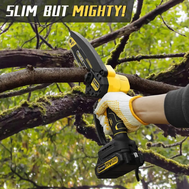 Compact cordless mini chainsaw cutting a tree branch