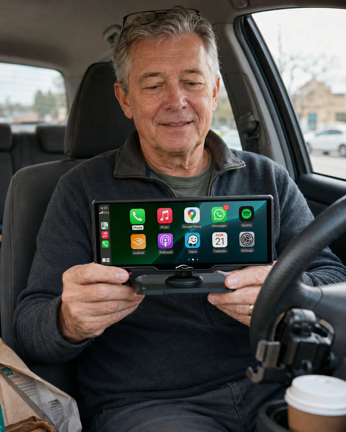 Driver using the CarPlay display